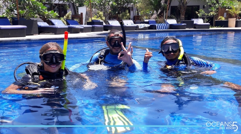 Scuba divers in the swimming pool